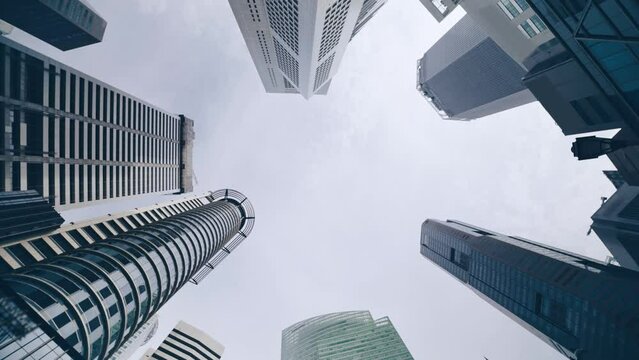 Singaporean business district aerial view. Looking up at modern office building architecture in Singapore
