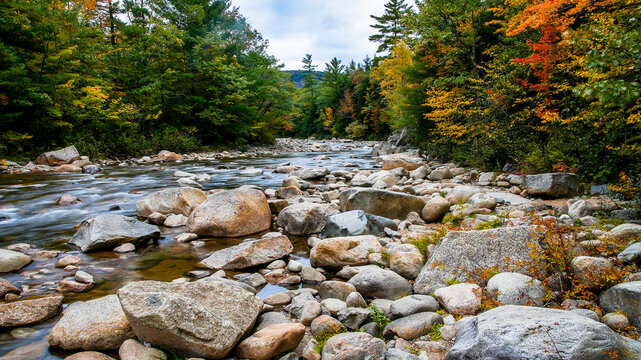 Swift river rocks near Kancamagus highway wirh autumn colors