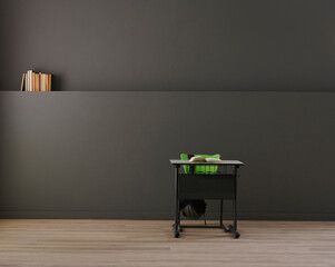 Children desk in the classroom, grey wall background, school accessory, interior, book, bag and pencil style.
