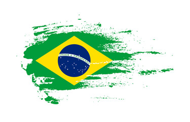 Grunge brush stroke flag of Brazil with painted brush splatter effect on solid background