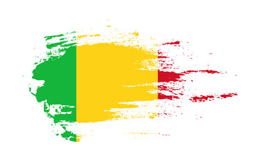 Grunge brush stroke flag of Mali with painted brush splatter effect on solid background