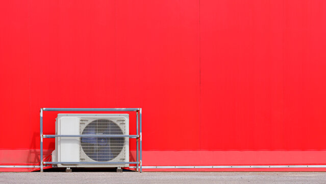 Exterior Architecture Background Of Air Conditioner Compressor On The Floor Outside Of Red Event Tent In Minimal Style