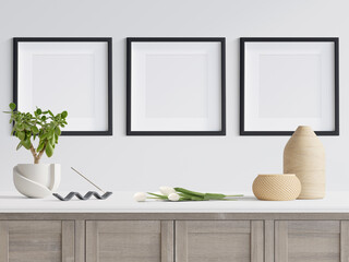 living interior with 3 blank picture frames cover