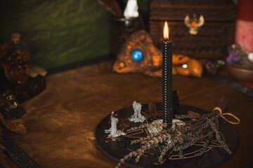 Candle burns on the altar, candles magic, clean aura and negative energy, wicca concept
