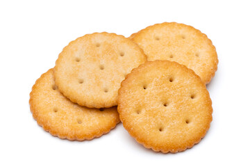 Healthy whole wheat cracker on white background. Stack of Saltine crackers isolated on white background. Round crackers.