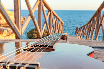 Fototapeta premium guitar close up on a bridge