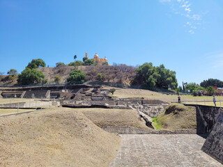 Panoramic view of the archaeological zone of Cholula and with the church 