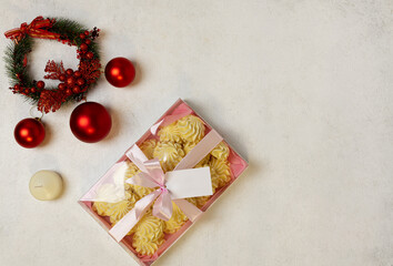 Red Christmas Balls with candles on a light background. Selective Focus. Space for copying. view from above.