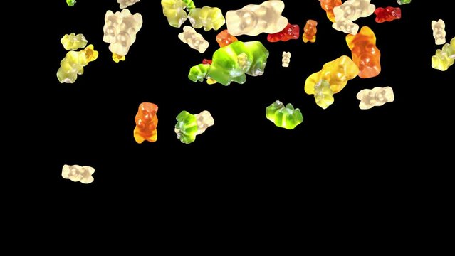 Falling colorful gummy bears. Isolated sweets. Black background. Loop. 25 fps