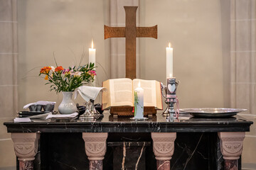 Festive interior decoration with burning candles in temple Church Christianity The ceremony of infant baptism Baptismal