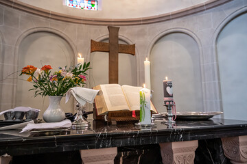 Festive interior decoration with burning candles in temple Church Christianity The ceremony of infant baptism Baptismal