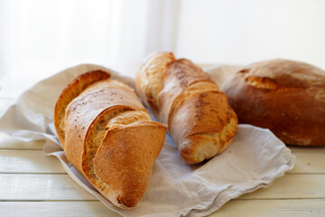 Loaf of bread on wooden table