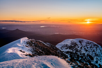 sunset over the mountains horizon