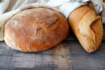 Loaf of bread on wooden table