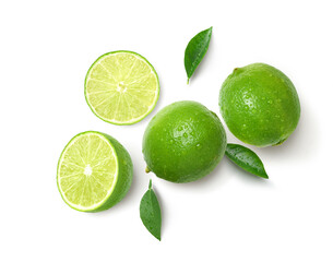 Flat lay of fresh lime with slices isolated on white background.