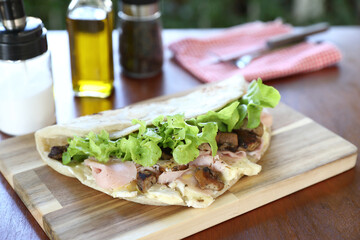 Italian cuisine , Piadina with Italian ham and cheese