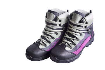 women's trekking boots on a white background. mountain women's tourism concept. hiking boots on light texture. shoes for working on light surfaces