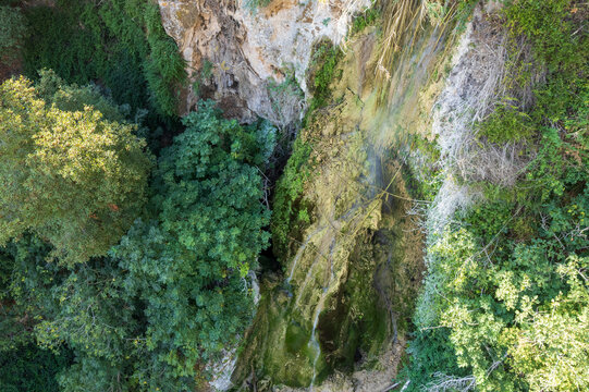 Arial view of a waterfall in a tropical forest