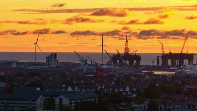 yellow sun rise at danish city