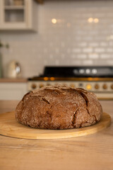 brown bread on a wooden table, close-up