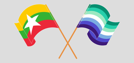 Crossed and waving flags of Myanmar and gay men pride