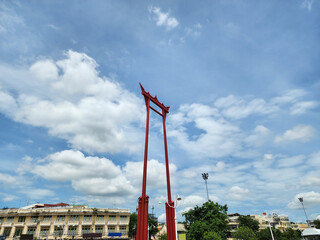 Giant Swing is an architecture made of teak painted in red, built for use in the Brahmin-Hindu ceremonial swing.Located in front of Wat Suthat Thepwararam now a tourist attraction of Bangkok,Thailand