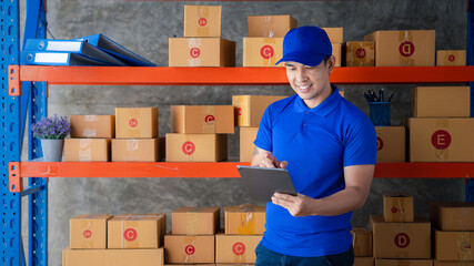 The man is in the warehouse waiting to be sold and delivered to the customers, the warehouse for...
