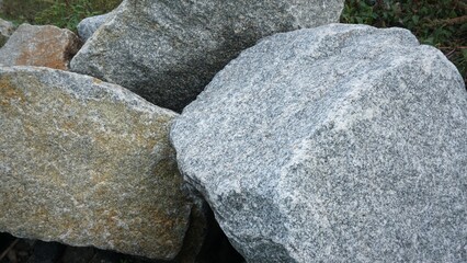 Fototapeta na wymiar smooth rock texture stone wall