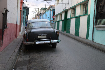 Vintage car in a street of Santiago de Cuba, Cuba
