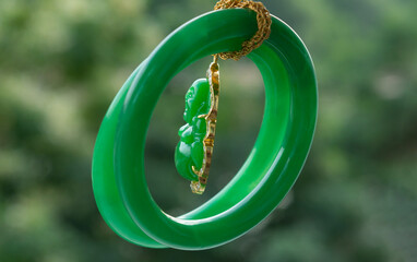 Real jade is a green jade bangle.