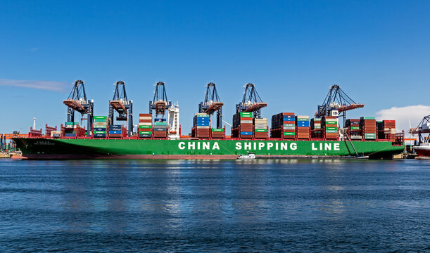 Container ship (CSCL Indian Ocean) from China Shipping Line being loaded by gantry cranes in the Maasvlakte in the Port of Rotterdam.