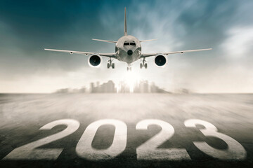 2023 number on airport runway with take off plane