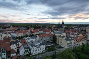 Obraz na płótnie Canvas Louny Czechia aerial landscape view of historical old city Louny Ceske stredohori Czech republic panorama church and old houses and fortifications 