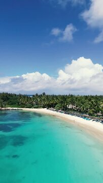 Drone Footage in Mauritius over Belle Mare Plage, a beautiful tropical beach in the Indian Ocean 