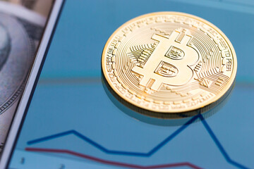 Bitcoins Crypto currency on chart exchange on Smartphone for trade cryptocurrency background