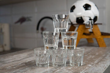 transparent glasses for alcohol mini bar in the form of a soccer ball