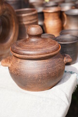 Fototapeta na wymiar Ceramics, a ceramic product made with their own hands, made on a potter's wheel, jug, mug, clay, ornament.