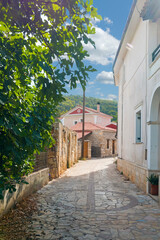 Fototapeta na wymiar Narrow street in an old village on Zakynthos (one of the Ionian Islands of Greece)
