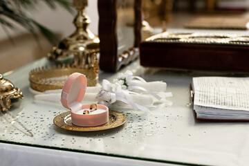 wedding rings in a box in the church
