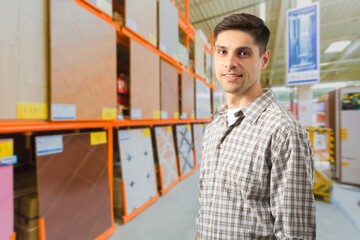 Adult man posing at work in warehouse