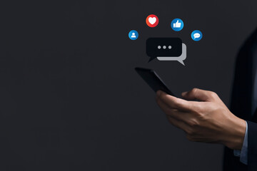 Businessmen use smartphones to communicate online on social media.	