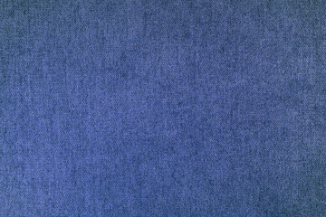 Texture background of velours blue fabric. Fabric texture of upholstery furniture textile material, design interior, wall decor. Fabric texture close up, backdrop, wallpaper.