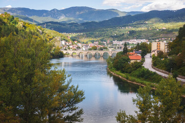 Beautiful view of Visegrad small town and famous Mehmed Pasa Sokolovic bridge on the Drina river,...
