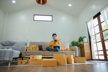 young businesswoman working online chat with packaging box, Business online influencer on social media concept, Online Selling, Online Shopping to market.