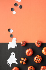 Cute Halloween vertical background, template for social media stories. Black and orange flat lay...
