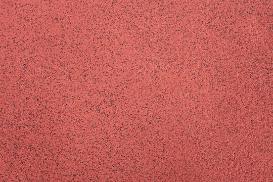 Running track red ground rubber cover. Texture, background. copy space for text