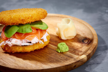 sushi menu with burger made from rice and smoked salmon, avocado, light cheese and nori