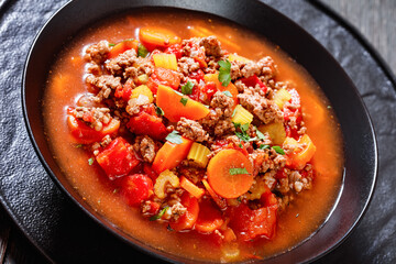 Hamburger Soup with barley and vegetables in bowl