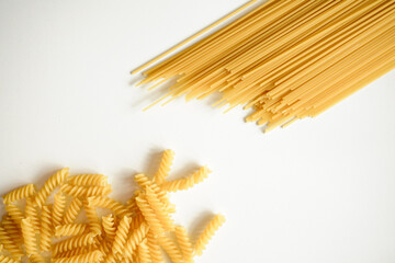 Sparretti and tortiglioni on white background top view