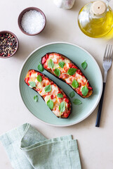 Baked eggplant with cheese mozzarella, tomatoes and basil. Healthy eating. Italian food. Parmigiana di melanzane.